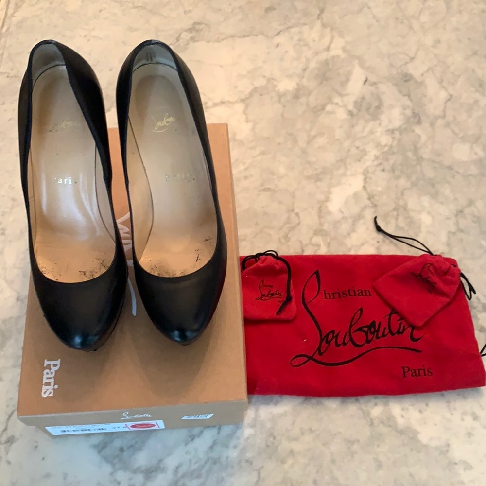 Black Anjalina Louboutins.